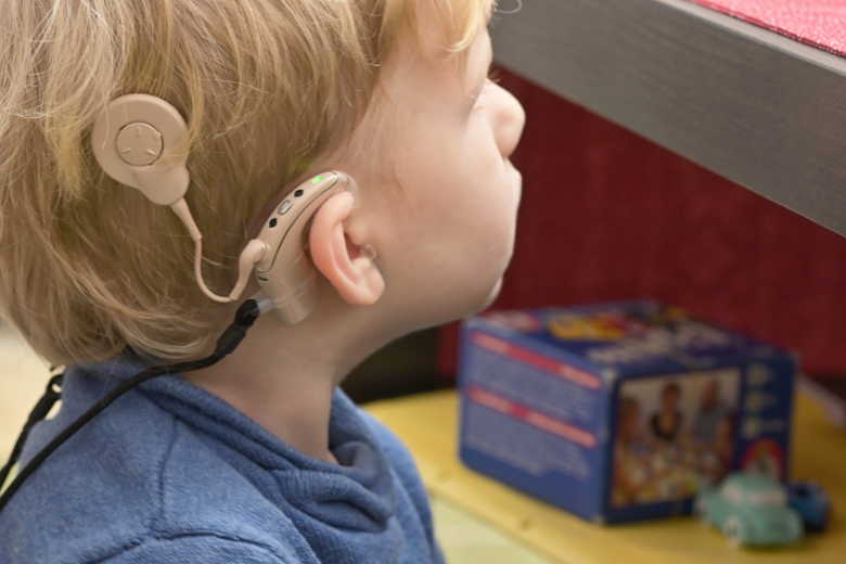 student with cochlear implant.png